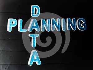 data planning text written on dark abstract background