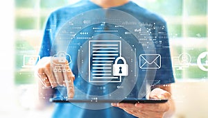 Data protection concept with man using a tablet