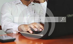 Data Search Technology Search Engine Optimization. man's hands are using a computer notebook to Searching for information