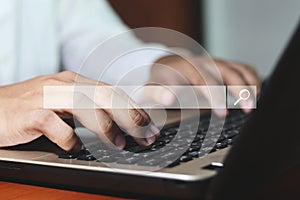 Data Search Technology Search Engine Optimization. man's hands are using a computer notebook to Searching for information