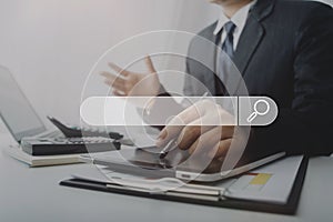 Data Search Technology Search Engine Optimization. man`s hands are using a computer notebook to Searching for information.Using