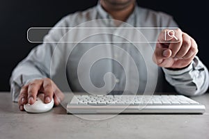 Data Search Technology. Man hand tapping on virtual search bar while using laptop