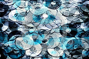 Data storage concept, layered silver blue abstraction of DVD and CD data disks