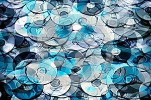 Data storage concept, layered silver blue abstraction of DVD and CD data storage disks