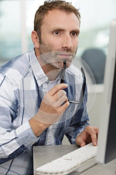 data system professional looking at screen