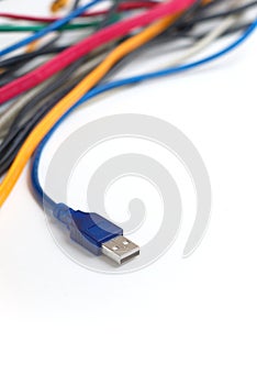 Data transfer computer connector with tangled cables on white background. Network infrastructure concept.