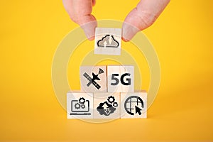 Data transfer icons on wooden cubes, yellow background