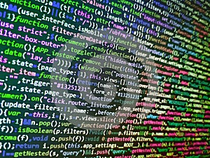 Database bits access stream visualisation. Shallow depth of field, selective focus effect. Programming code screen of software