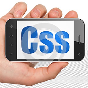 Database concept: Hand Holding Smartphone with Css on display