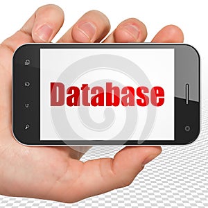 Database concept: Hand Holding Smartphone with Database on display