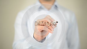 Database, Man writing on transparent screen