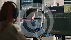 Database programer writing code on terminal window