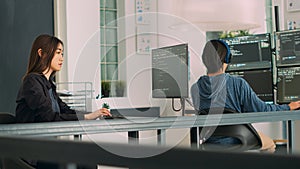 Database programer writing source code with coding language in it development