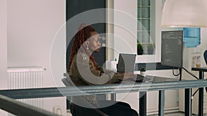 Database programer writing source code and script on terminal window