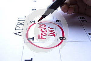 The date of April 1 is circled on the calendar. April Fool`s Day