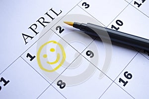 The date of April 1 is circled on the calendar. April Fool`s Day photo