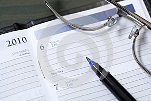 Date book and a pen.