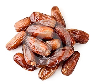 Date fruit pile on white top view. Isolated