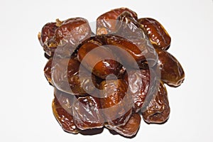 date palm seeds on a white background