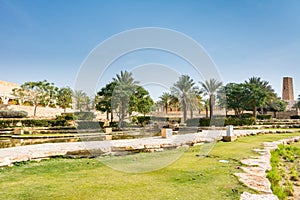 Date trees and ruins of Diraiyah clay castle, also as Dereyeh and Dariyya, a town in Riyadh, Saudi Arabia, was the original home photo
