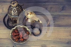 Dates, arabian lantern and rosary. Ramadan decoration