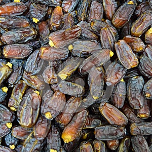 Dried date hurma palm fruit brown color photo