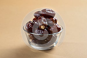 Dates in glass bowl. Dries dates fruit