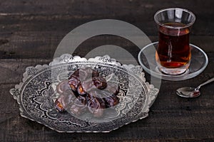 Dates in a handmade traditional Persian Toreutic plate
