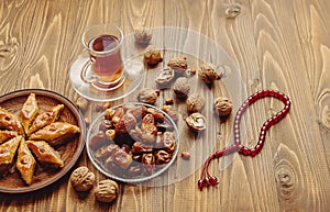 Dates, rosaries and baklava. Ramadan. Selective focus