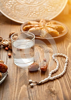Dates, rosaries and baklava. Ramadan. Selective focus