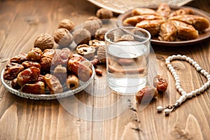 Dates, rosaries and baklava. Ramadan. Selective focus