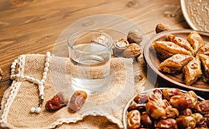 Dates, rosaries and baklava. Ramadan. Selective focus