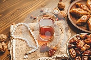 Dates, rosaries and baklava. Ramadan. Selective focus