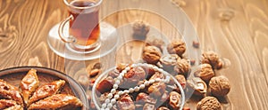 Dates, rosaries and baklava. Ramadan. Selective focus