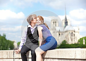 Dating couple enjoying warm day in Paris