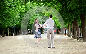 Dating couple in Luxembourg garden