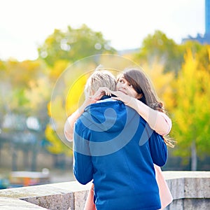 Dating couple in Paris on a fall day