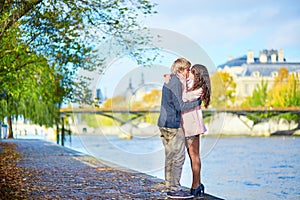 Dating couple in Paris on a spring day