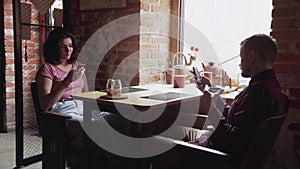 Dating couple relaxing together in chinese tea cafe
