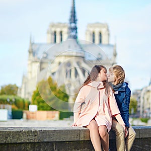 Dating couple on the Seine embankment in Paris