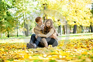 Dating couple in yellow leaves