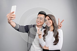 Dating young couple in love. Portrait of smiling asian couple on