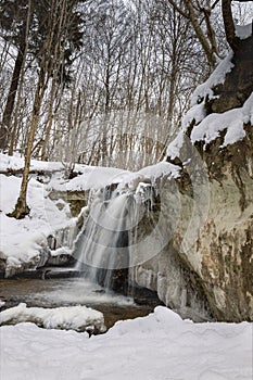 Dauda waterfall in winter .Small waterfall in Gauja national park
