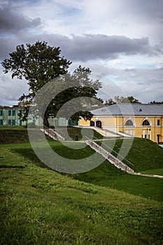 Daugavpils fortress, scene with nice clouds and green path.