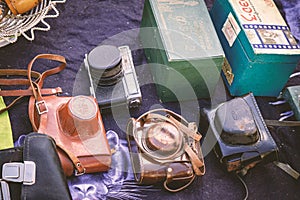 Daugavpils, Latvia - 16 09 2023: Old photography cameras in cases at monthly flea market