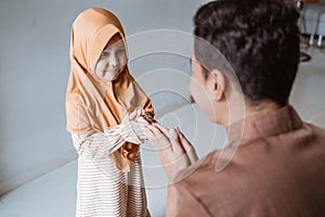 Daughter asking for forgiveness from father