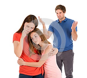 Daughter Comforting Mother While Her Parent Having Conflict photo