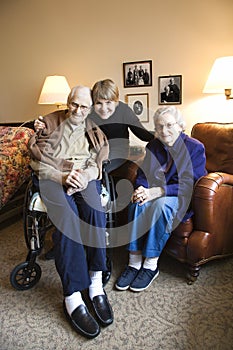 Daughter with elderly mother and father.