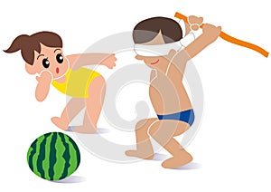 Daughter and father go swimming and split watermelon on the sandy beach photo
