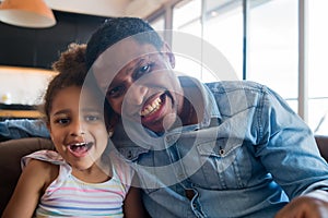 Daughter and father at home. photo